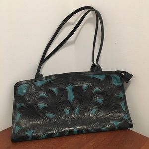 Leaders in Leather bag